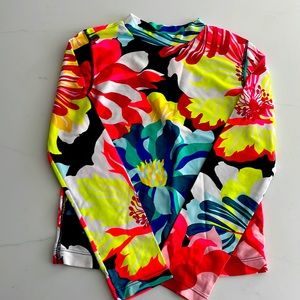 Gap Kids Girls Multi-floral long sleeve rashguard.